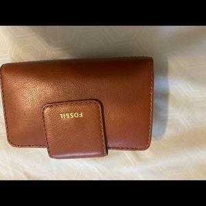 Fossil small trifold wallet in excellent condition ready for a new home